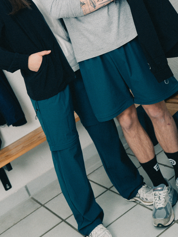 Tech zip-off-bukse | Unisex Petroleumsblå